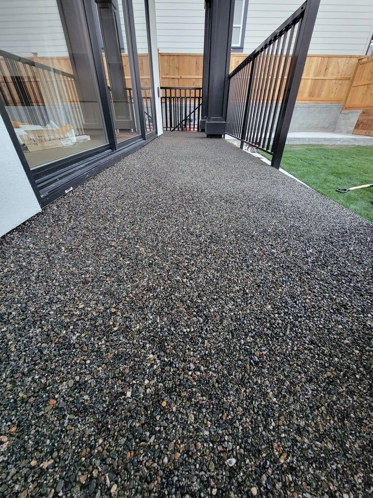 A pebble epoxy surface laid across an outdoor walkway